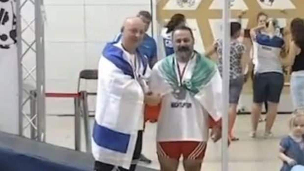 İsrailli rakibinin elini sıkan haltercinin kariyeri sonlandırıldı