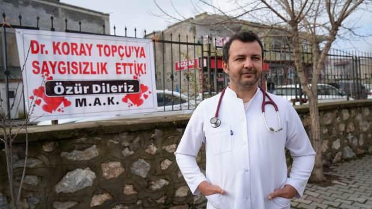 Tartıştıkları doktora 'özür' pankartı!