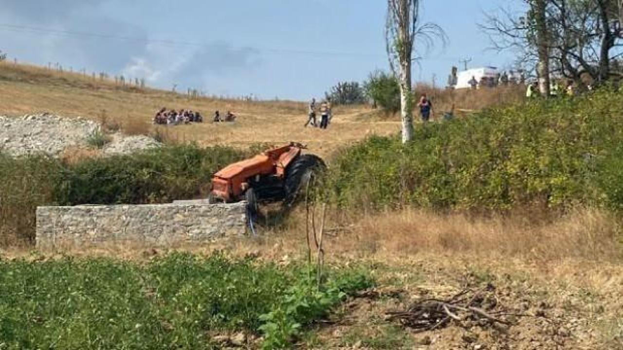 Traktörün altında kalan sürücü öldü, eşi yaralandı