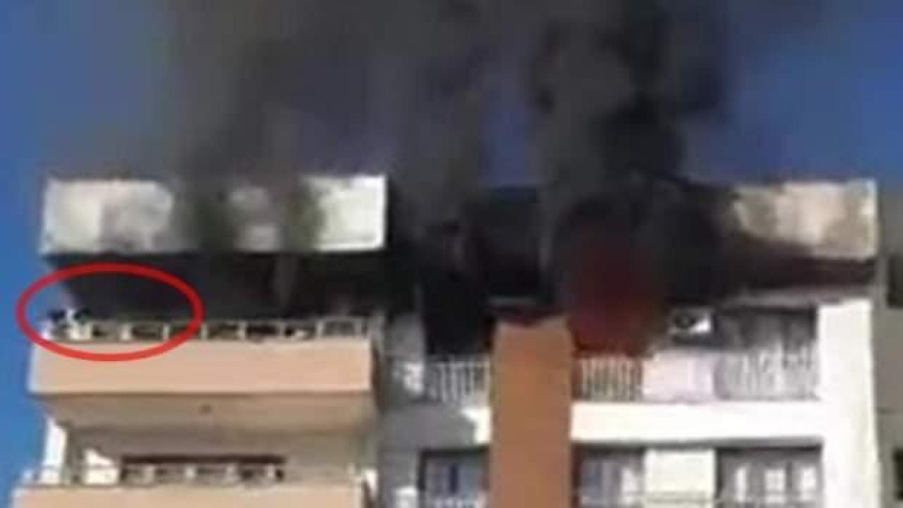 Yangında balkonda mahsur kalan aileyi itfaiye kurtardı!