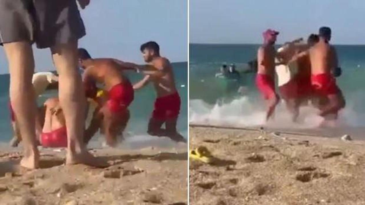 Yasak yerde denize girmeye kalktı, cankurtaranlar feci dövdü!